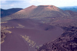 Sunset Crater Volcano surrounded by cinder fields and lava flows